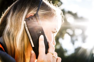 Satellite Communications - Image showing woman using satellite phone